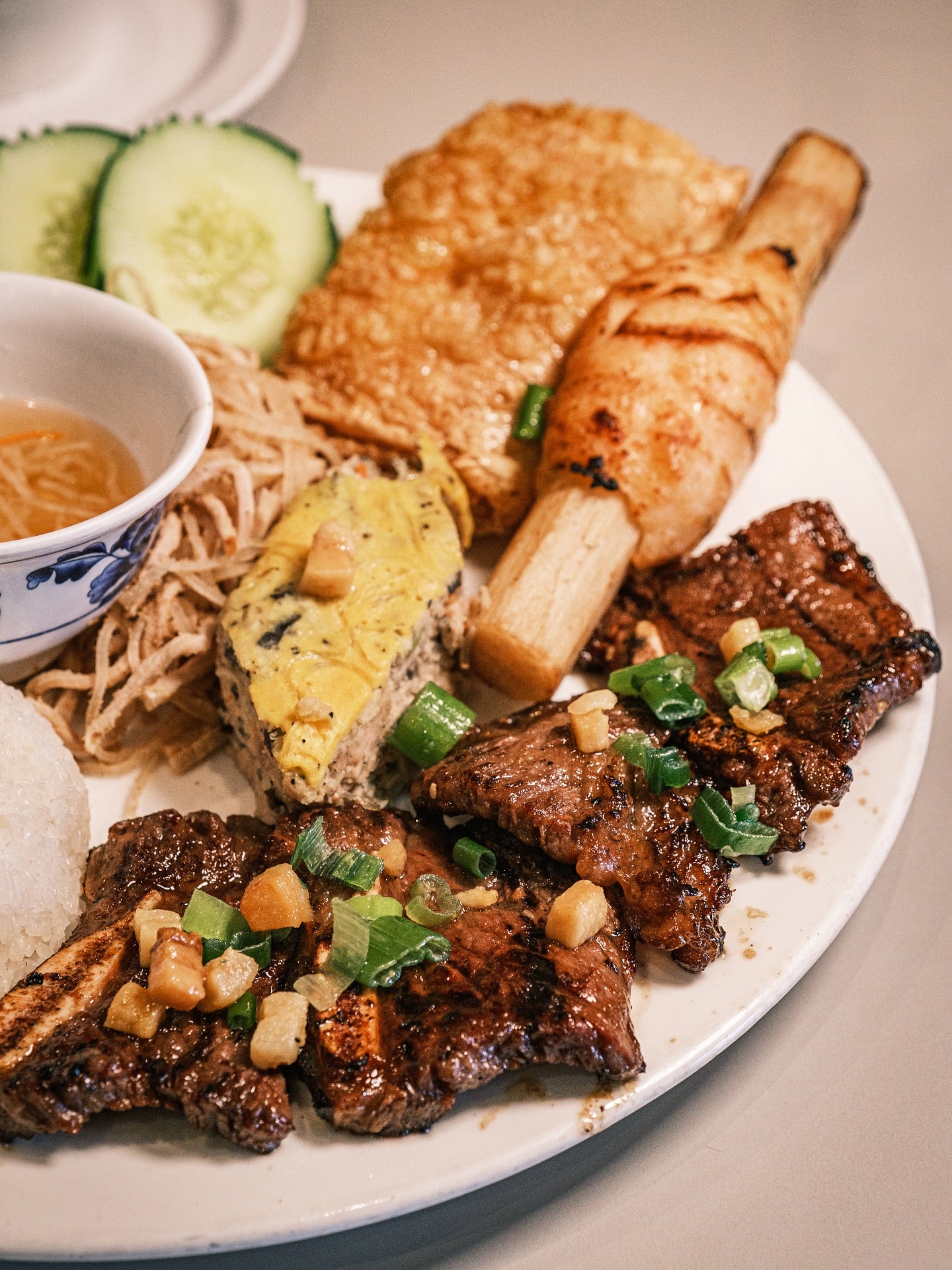 126. BBQ Korean Short Rib, Shredded Pork Skin, Egg Cake, Grilled Shrimp on Sugar Cane over Rice 碎米饭配韩国烤牛排骨、腐皮卷、猪皮丝、蒸肉饼和甘蔗虾 Shredded Pork Skin, Egg Cake, Grilled Shrimp on Sugar Cane over Rice
